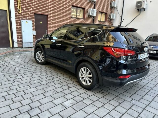 Черный Хендай Санта Фе, объемом двигателя 2 л и пробегом 110 тыс. км за 17500 $, фото 2 на Automoto.ua