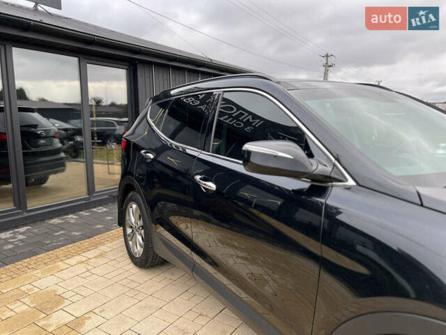 Черный Хендай Санта Фе, объемом двигателя 2 л и пробегом 176 тыс. км за 13600 $, фото 4 на Automoto.ua