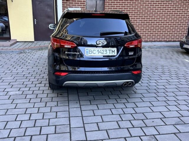 Черный Хендай Санта Фе, объемом двигателя 2 л и пробегом 110 тыс. км за 17500 $, фото 1 на Automoto.ua