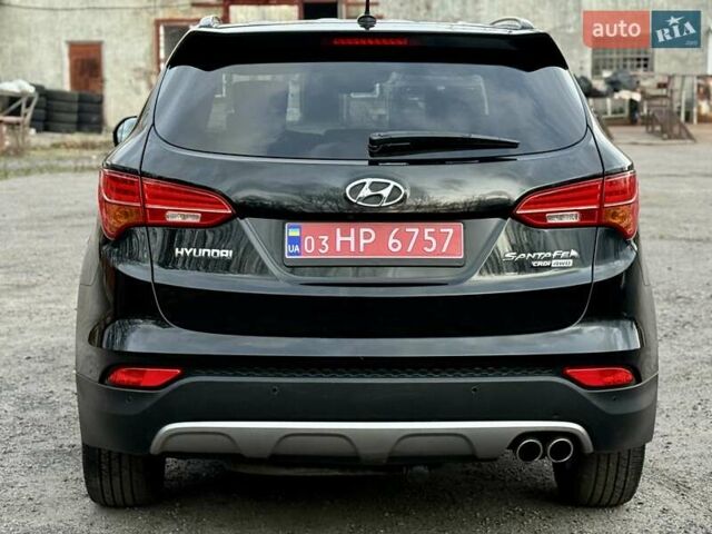 Черный Хендай Санта Фе, объемом двигателя 2.2 л и пробегом 129 тыс. км за 21877 $, фото 4 на Automoto.ua