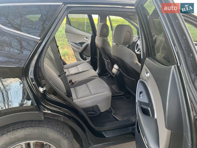 Черный Хендай Санта Фе, объемом двигателя 2.4 л и пробегом 296 тыс. км за 14750 $, фото 8 на Automoto.ua