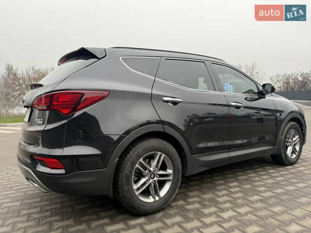 Черный Хендай Санта Фе, объемом двигателя 2.36 л и пробегом 128 тыс. км за 15700 $, фото 11 на Automoto.ua