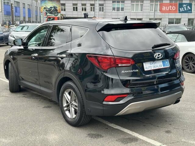 Черный Хендай Санта Фе, объемом двигателя 2.36 л и пробегом 130 тыс. км за 14690 $, фото 6 на Automoto.ua