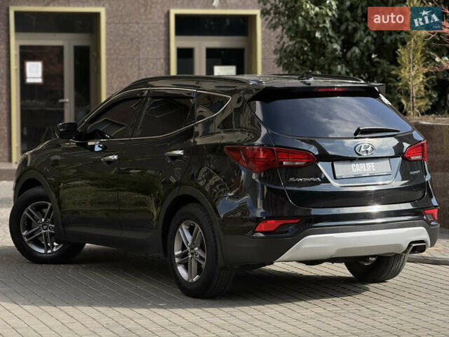 Чорний Хендай Санта Фе, об'ємом двигуна 2.4 л та пробігом 150 тис. км за 14500 $, фото 12 на Automoto.ua