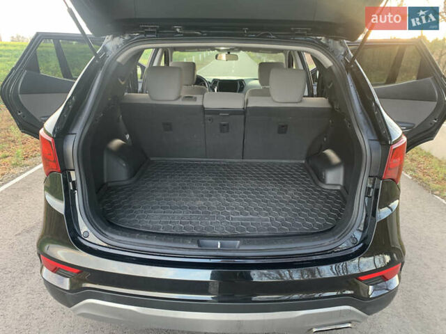 Черный Хендай Санта Фе, объемом двигателя 2.4 л и пробегом 296 тыс. км за 14750 $, фото 10 на Automoto.ua