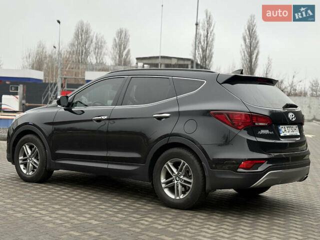 Черный Хендай Санта Фе, объемом двигателя 2.36 л и пробегом 128 тыс. км за 15700 $, фото 14 на Automoto.ua