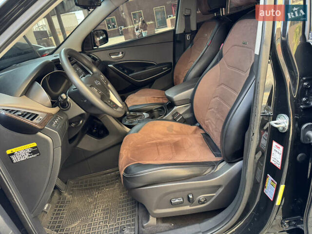 Чорний Хендай Санта Фе, об'ємом двигуна 2.4 л та пробігом 150 тис. км за 14500 $, фото 18 на Automoto.ua