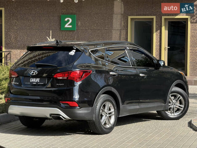 Чорний Хендай Санта Фе, об'ємом двигуна 2.4 л та пробігом 150 тис. км за 14500 $, фото 9 на Automoto.ua