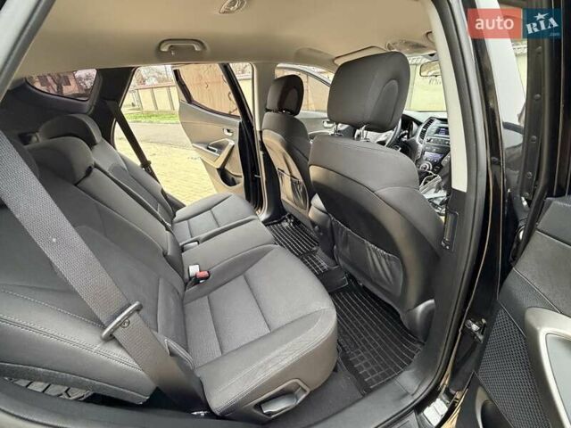 Черный Хендай Санта Фе, объемом двигателя 2.36 л и пробегом 141 тыс. км за 13699 $, фото 17 на Automoto.ua