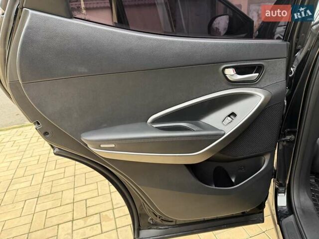 Черный Хендай Санта Фе, объемом двигателя 2.36 л и пробегом 141 тыс. км за 13699 $, фото 18 на Automoto.ua