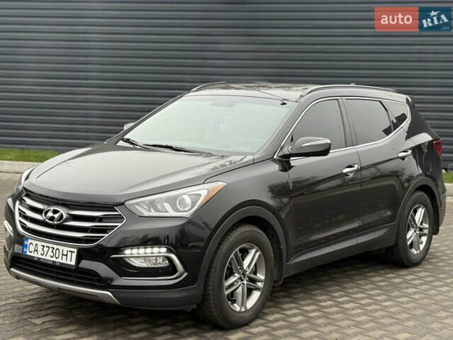 Черный Хендай Санта Фе, объемом двигателя 2.36 л и пробегом 128 тыс. км за 15700 $, фото 2 на Automoto.ua