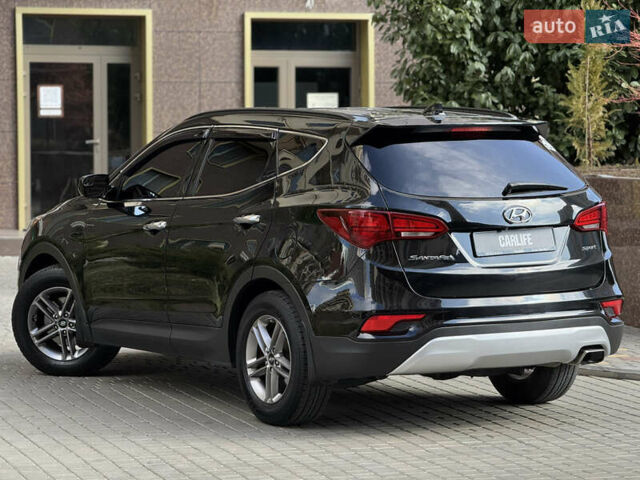Чорний Хендай Санта Фе, об'ємом двигуна 2.4 л та пробігом 150 тис. км за 14500 $, фото 13 на Automoto.ua