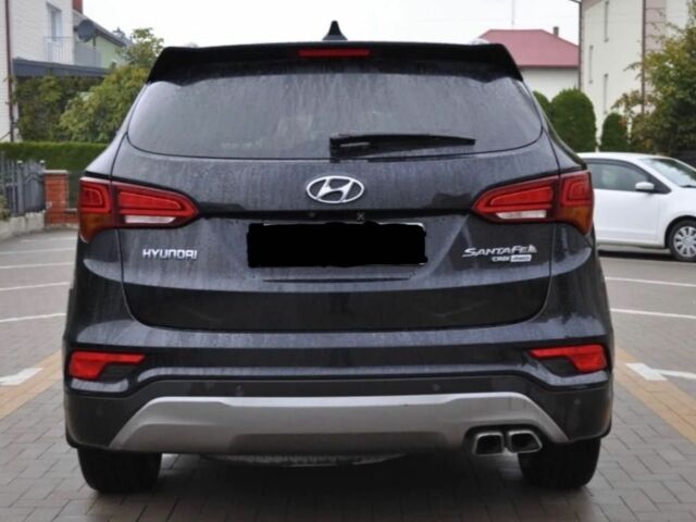 Черный Хендай Санта Фе, объемом двигателя 2 л и пробегом 100 тыс. км за 8300 $, фото 1 на Automoto.ua