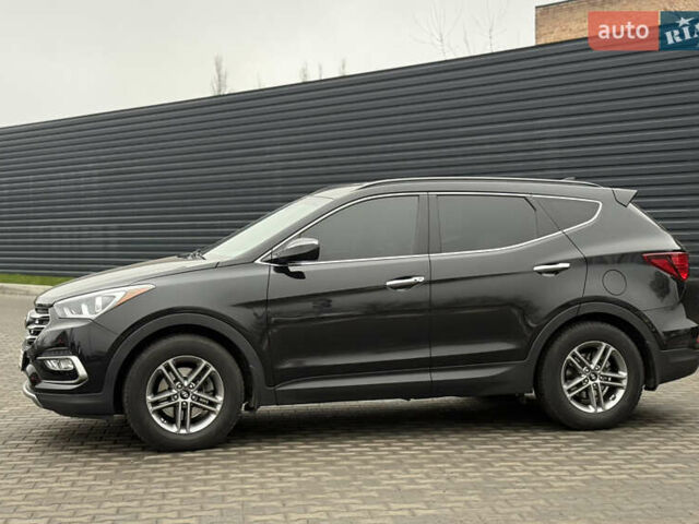 Черный Хендай Санта Фе, объемом двигателя 2.36 л и пробегом 128 тыс. км за 15700 $, фото 15 на Automoto.ua