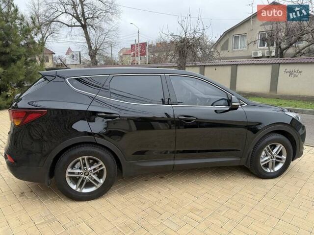 Черный Хендай Санта Фе, объемом двигателя 2.36 л и пробегом 141 тыс. км за 13699 $, фото 6 на Automoto.ua
