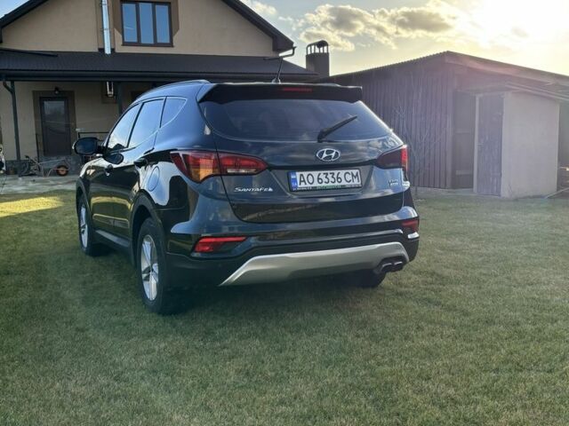 Черный Хендай Санта Фе, объемом двигателя 2.2 л и пробегом 210 тыс. км за 16900 $, фото 1 на Automoto.ua