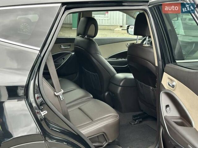 Черный Хендай Санта Фе, объемом двигателя 2.36 л и пробегом 130 тыс. км за 14690 $, фото 23 на Automoto.ua