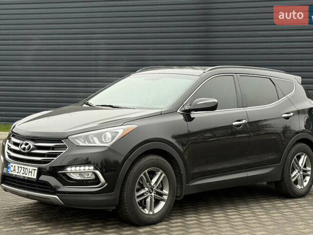 Черный Хендай Санта Фе, объемом двигателя 2.36 л и пробегом 128 тыс. км за 15700 $, фото 1 на Automoto.ua