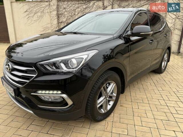 Черный Хендай Санта Фе, объемом двигателя 2.36 л и пробегом 141 тыс. км за 13699 $, фото 4 на Automoto.ua