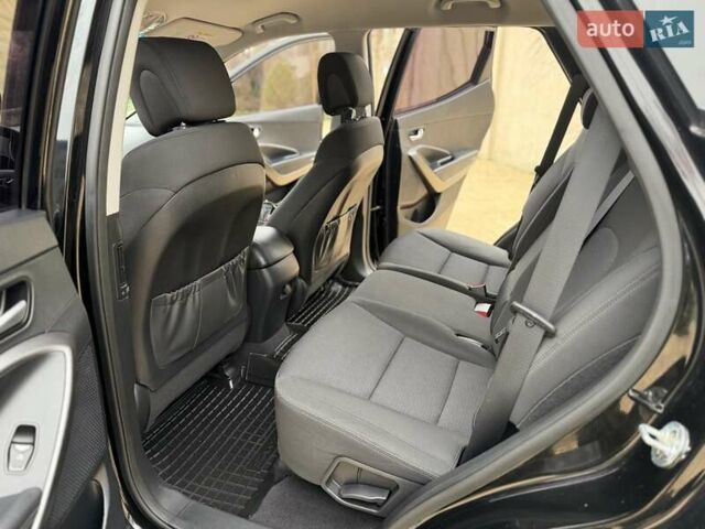 Черный Хендай Санта Фе, объемом двигателя 2.36 л и пробегом 141 тыс. км за 13699 $, фото 16 на Automoto.ua