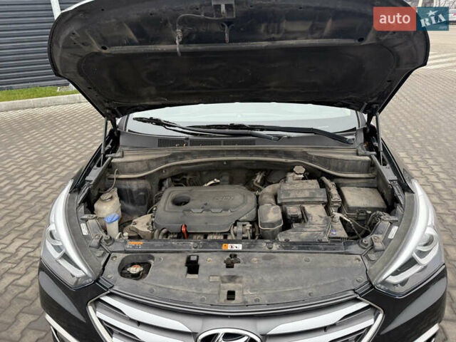 Черный Хендай Санта Фе, объемом двигателя 2.36 л и пробегом 128 тыс. км за 15700 $, фото 47 на Automoto.ua