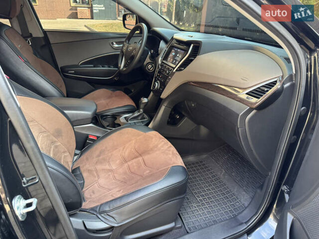 Чорний Хендай Санта Фе, об'ємом двигуна 2.4 л та пробігом 150 тис. км за 14500 $, фото 28 на Automoto.ua
