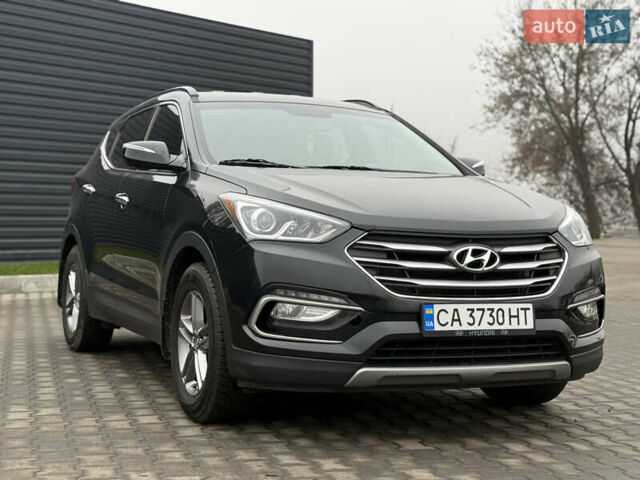 Черный Хендай Санта Фе, объемом двигателя 2.36 л и пробегом 128 тыс. км за 15700 $, фото 5 на Automoto.ua