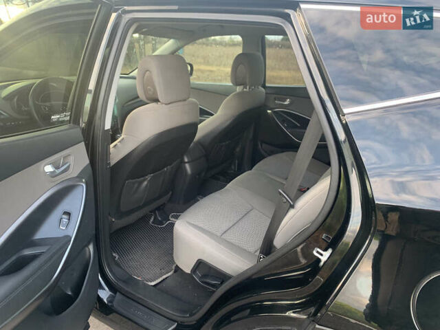 Черный Хендай Санта Фе, объемом двигателя 2.4 л и пробегом 296 тыс. км за 14750 $, фото 9 на Automoto.ua