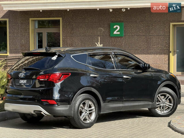 Чорний Хендай Санта Фе, об'ємом двигуна 2.4 л та пробігом 150 тис. км за 14500 $, фото 10 на Automoto.ua