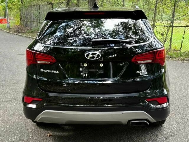 Чорний Хендай Санта Фе, об'ємом двигуна 2.4 л та пробігом 52 тис. км за 14100 $, фото 4 на Automoto.ua