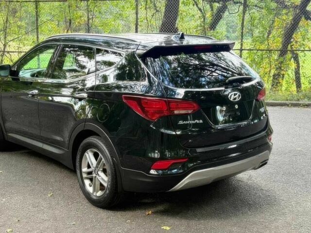 Черный Хендай Санта Фе, объемом двигателя 2.4 л и пробегом 50 тыс. км за 4100 $, фото 5 на Automoto.ua