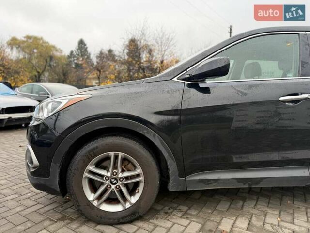 Черный Хендай Санта Фе, объемом двигателя 2.4 л и пробегом 245 тыс. км за 11200 $, фото 2 на Automoto.ua
