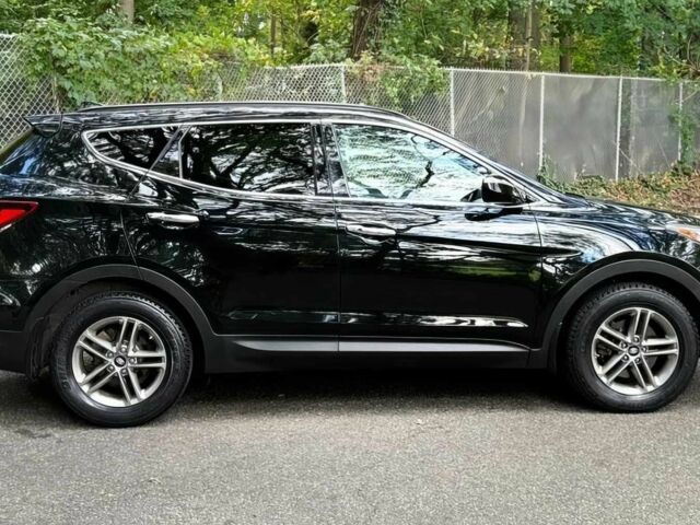 Чорний Хендай Санта Фе, об'ємом двигуна 2.4 л та пробігом 52 тис. км за 14100 $, фото 6 на Automoto.ua