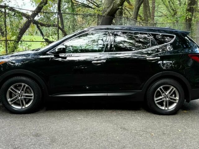 Чорний Хендай Санта Фе, об'ємом двигуна 2.4 л та пробігом 52 тис. км за 14100 $, фото 2 на Automoto.ua