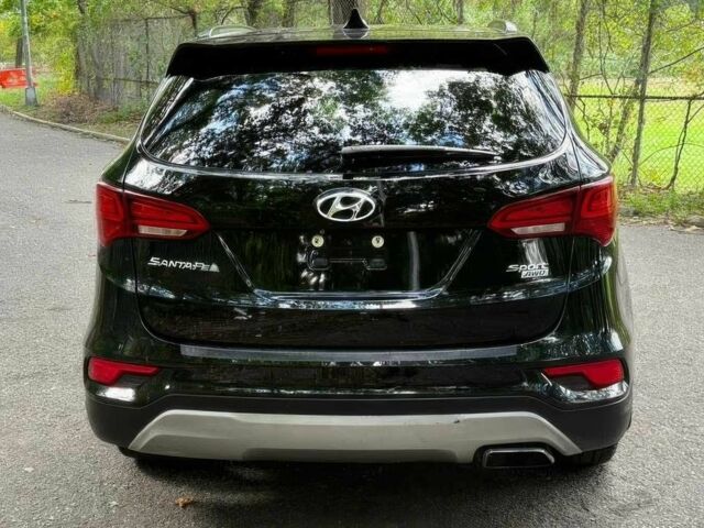 Черный Хендай Санта Фе, объемом двигателя 2.4 л и пробегом 50 тыс. км за 4100 $, фото 4 на Automoto.ua