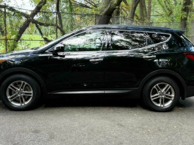 Черный Хендай Санта Фе, объемом двигателя 2.4 л и пробегом 50 тыс. км за 4100 $, фото 6 на Automoto.ua