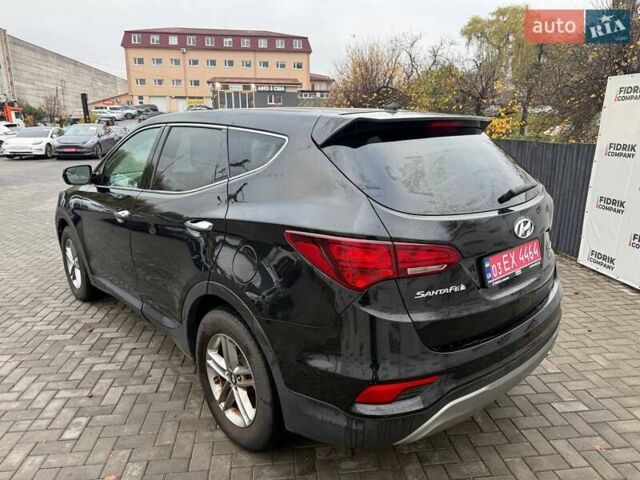 Черный Хендай Санта Фе, объемом двигателя 2.4 л и пробегом 245 тыс. км за 11200 $, фото 3 на Automoto.ua
