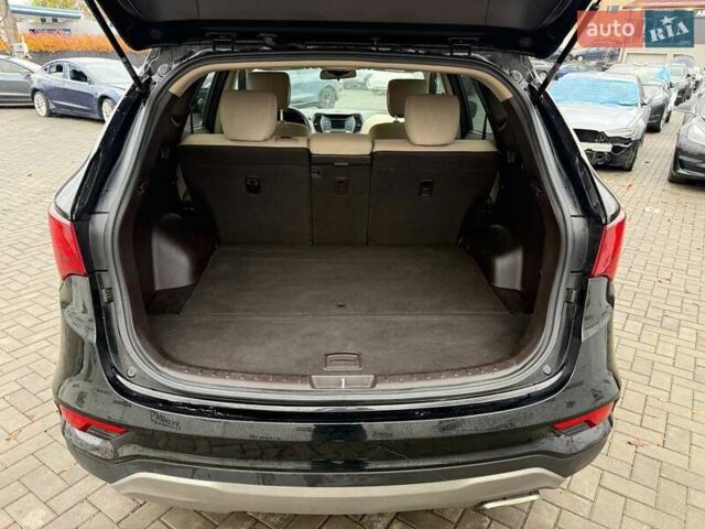 Черный Хендай Санта Фе, объемом двигателя 2.4 л и пробегом 245 тыс. км за 11200 $, фото 7 на Automoto.ua