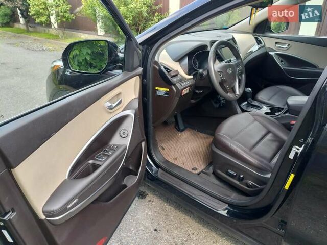 Черный Хендай Санта Фе, объемом двигателя 2.36 л и пробегом 130 тыс. км за 17500 $, фото 4 на Automoto.ua