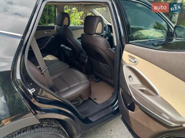 Черный Хендай Санта Фе, объемом двигателя 2.36 л и пробегом 130 тыс. км за 17500 $, фото 7 на Automoto.ua