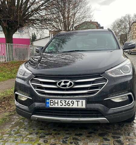 Чорний Хендай Санта Фе, об'ємом двигуна 2 л та пробігом 84 тис. км за 19446 $, фото 1 на Automoto.ua