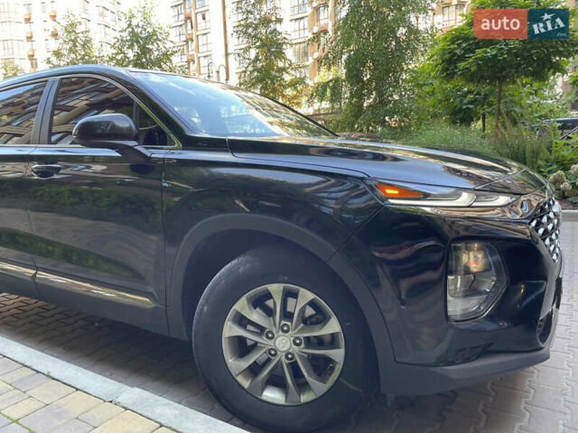 Черный Хендай Санта Фе, объемом двигателя 2.36 л и пробегом 45 тыс. км за 20500 $, фото 4 на Automoto.ua