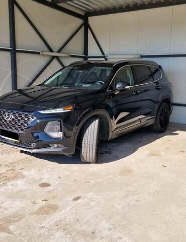 Черный Хендай Санта Фе, объемом двигателя 2.36 л и пробегом 152 тыс. км за 23700 $, фото 2 на Automoto.ua