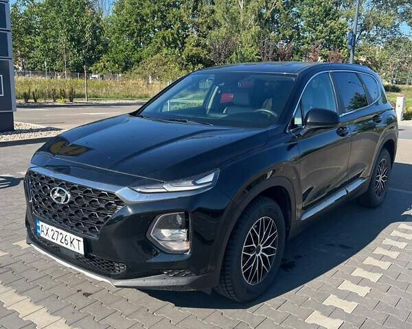 Черный Хендай Санта Фе, объемом двигателя 2.36 л и пробегом 80 тыс. км за 19999 $, фото 1 на Automoto.ua