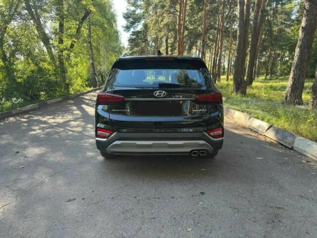 Черный Хендай Санта Фе, объемом двигателя 2 л и пробегом 120 тыс. км за 24000 $, фото 4 на Automoto.ua