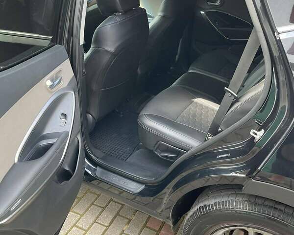 Черный Хендай Санта Фе, объемом двигателя 2.36 л и пробегом 125 тыс. км за 16700 $, фото 5 на Automoto.ua