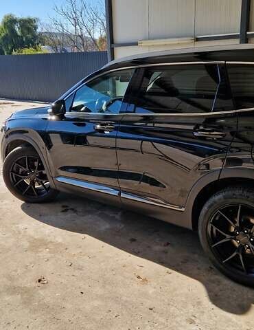 Черный Хендай Санта Фе, объемом двигателя 2.36 л и пробегом 152 тыс. км за 23700 $, фото 1 на Automoto.ua