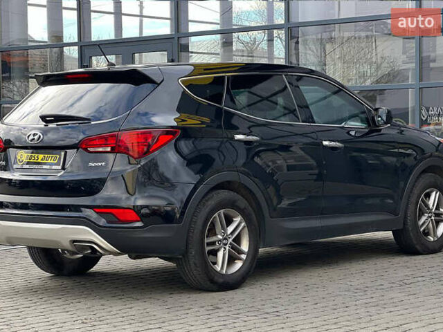 Черный Хендай Санта Фе, объемом двигателя 2.36 л и пробегом 130 тыс. км за 16300 $, фото 4 на Automoto.ua