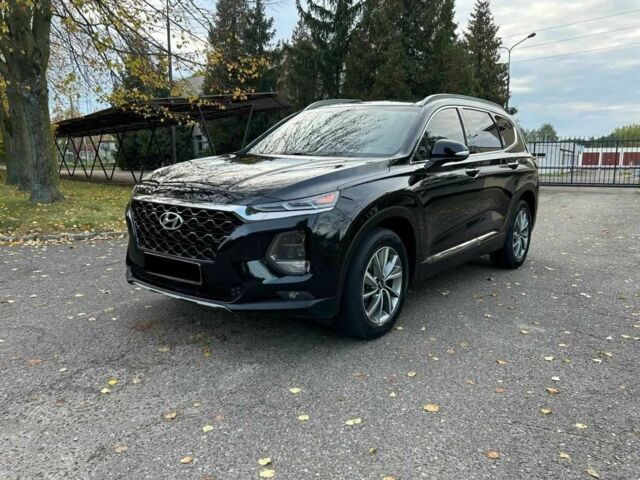 Черный Хендай Санта Фе, объемом двигателя 2.4 л и пробегом 105 тыс. км за 11200 $, фото 1 на Automoto.ua