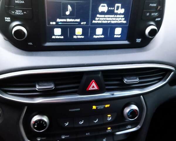 Чорний Хендай Санта Фе, об'ємом двигуна 2.4 л та пробігом 100 тис. км за 25000 $, фото 13 на Automoto.ua